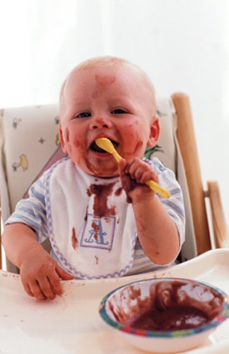 Child Eating Messy Snack
